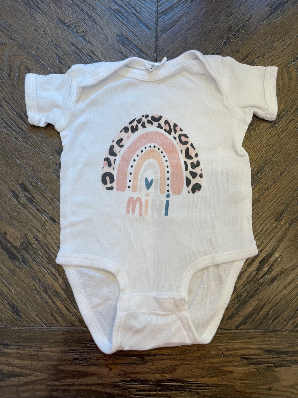 Rabbit Skins White One-Piece with Pink Leopard Rainbow Graphic